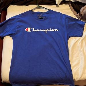 A blue champion shirt that can be worn with anything.